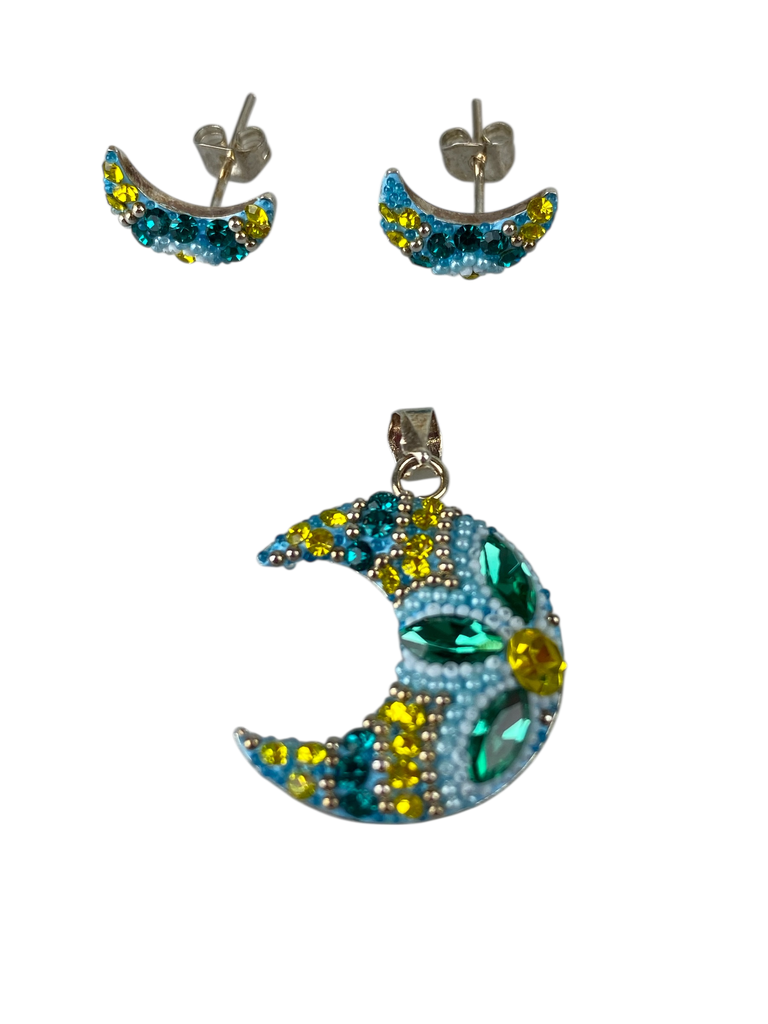 JUEGO DIJE Y ARETES LUNA AZUL